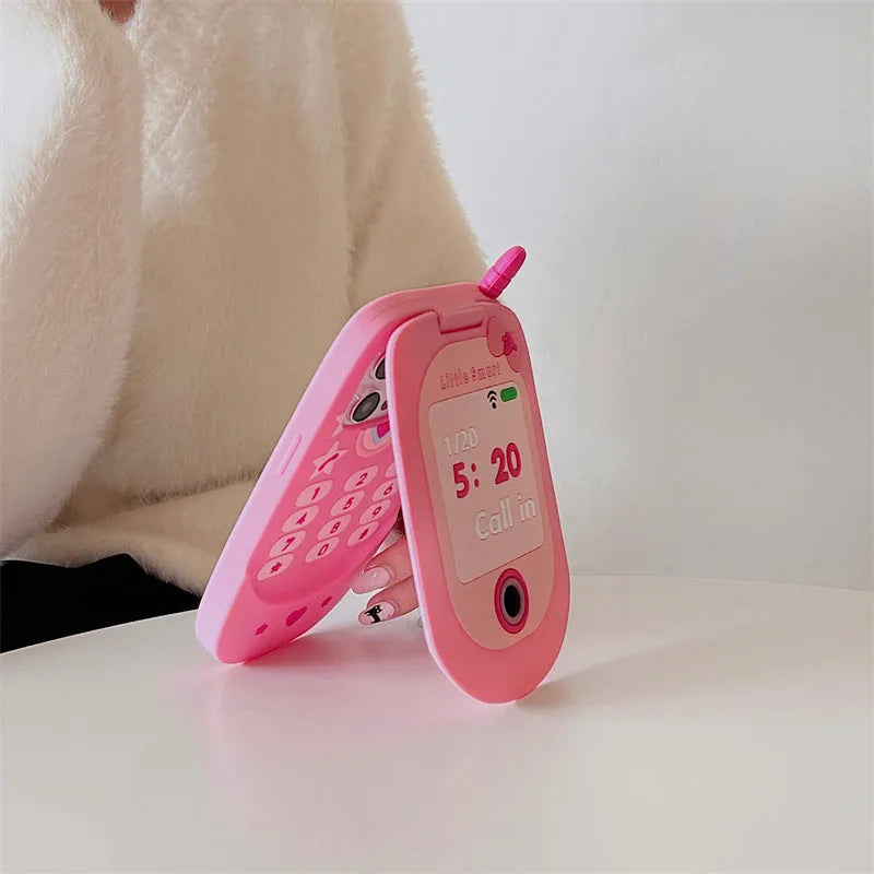 Light pink silicone flip phone case with a mirror, shown next to a rose red version, for iPhone models.