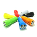 Dual USB car charger with blue LED indicator light and piano paint finish measuring 6x4.2x4.2cm
