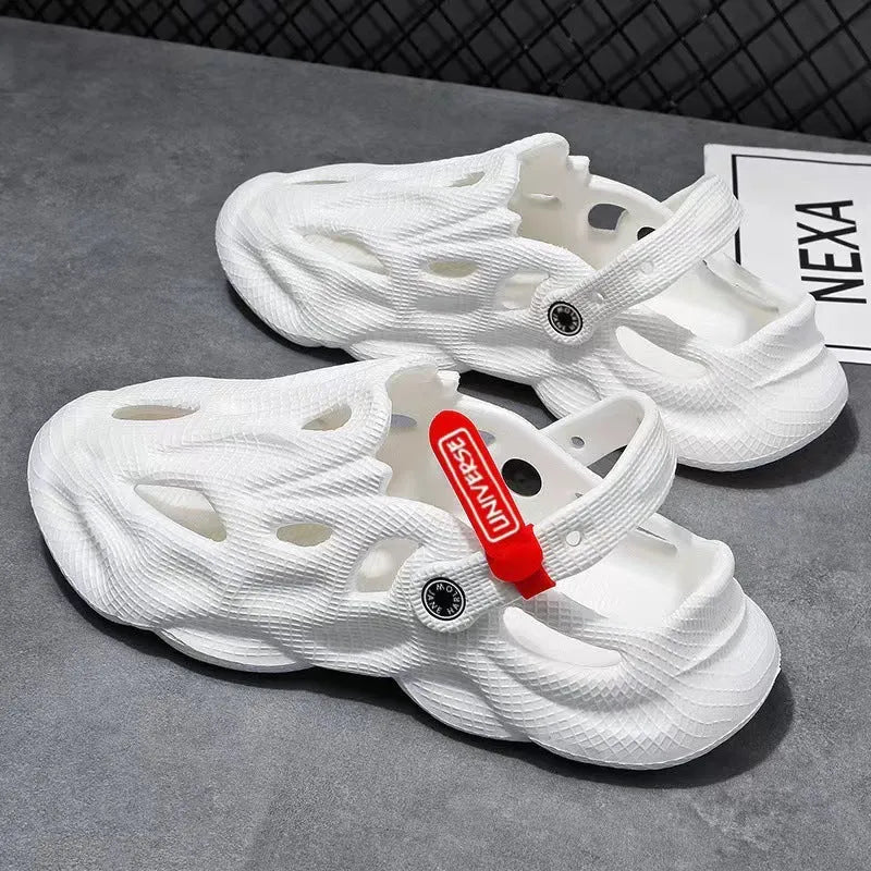 Pair of solid grey closed-toe EVA coconut slippers on a white background.
