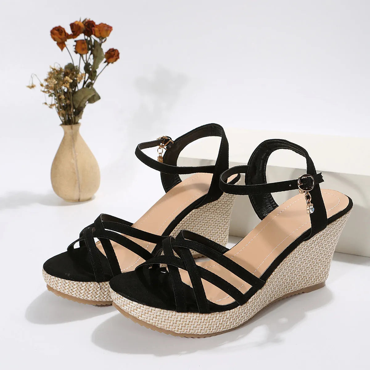 Women's beige fabric wedge sandals with fish mouth toe opening on wooden floor