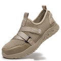 Men's grey anti-smash and anti-puncture safety shoes with a flying woven upper and rubber sole.