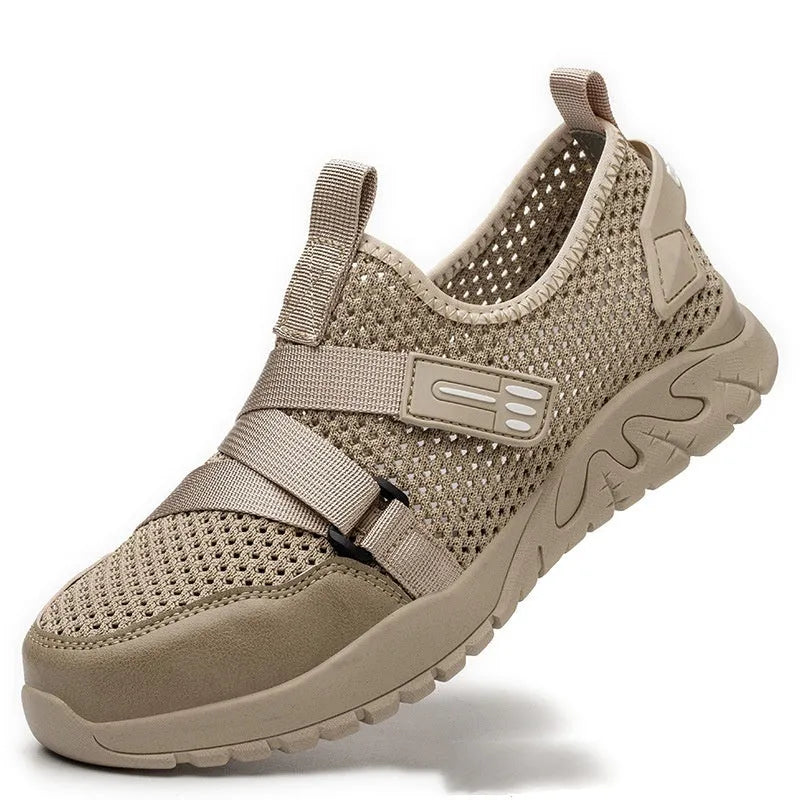 Men's grey anti-smash and anti-puncture safety shoes with a flying woven upper and rubber sole.