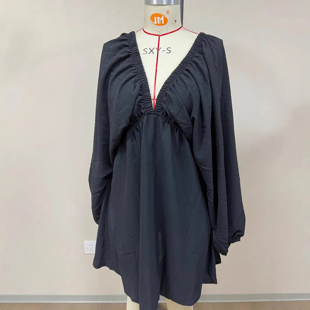 Women's apricot V-neck dress with puff sleeves and swing skirt design for office wear