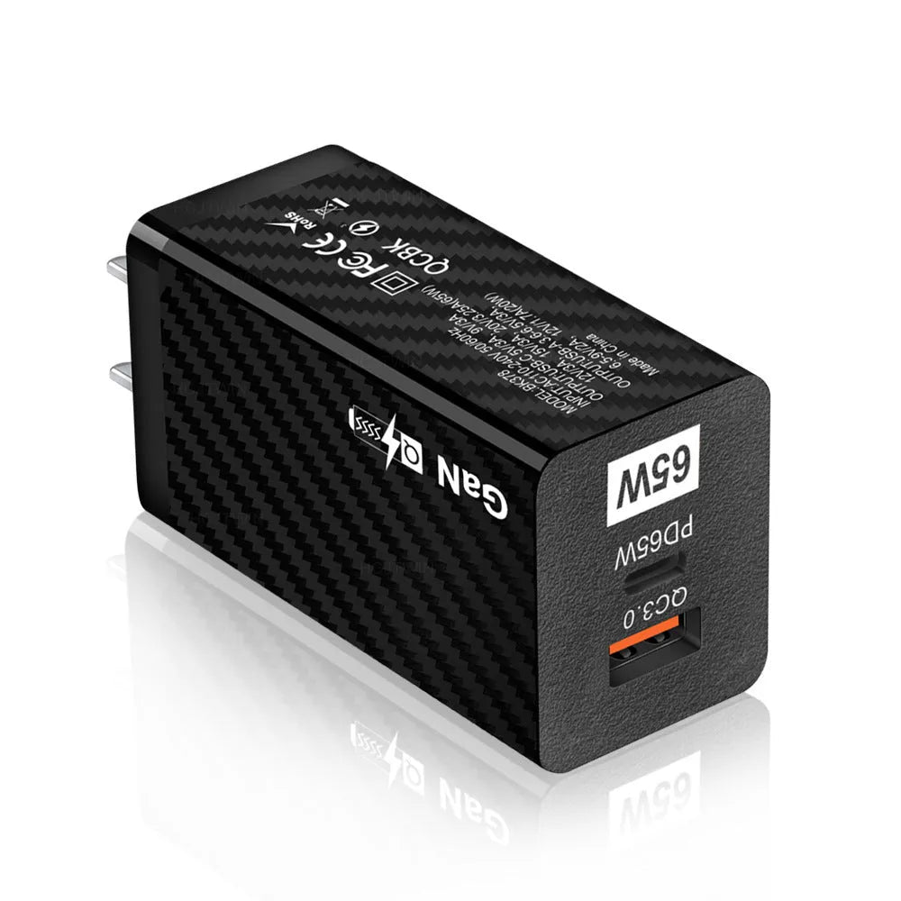 65W gallium nitride fast charger in black or white with compact rectangular design and USB-PD port