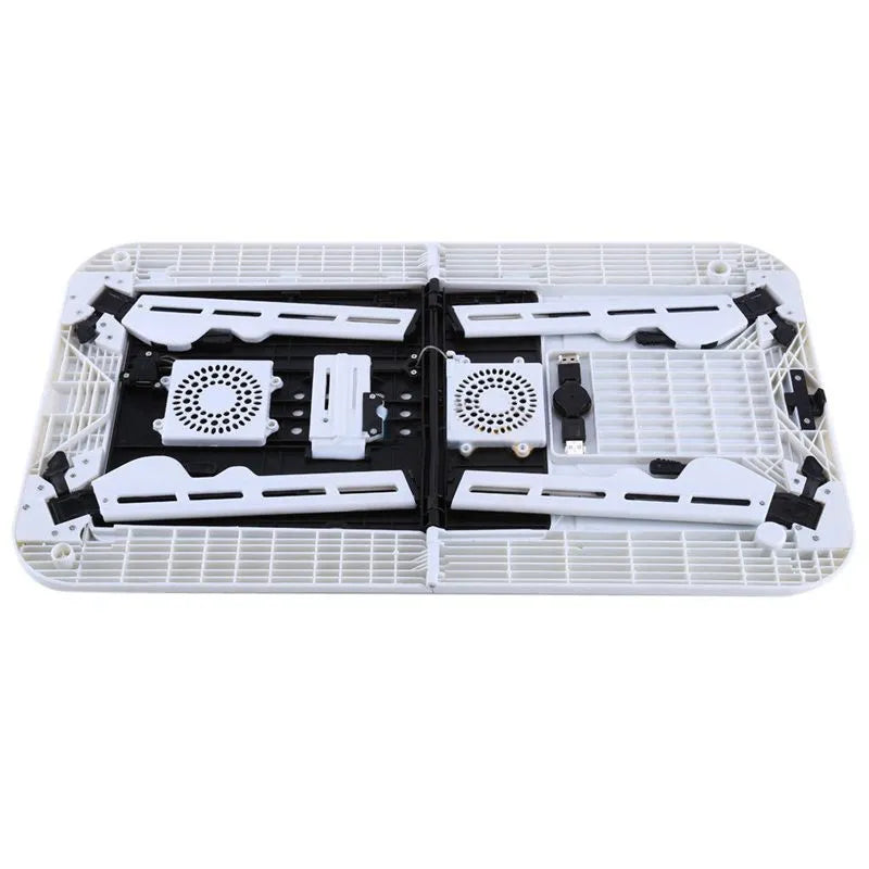 White folding ABS laptop desk with adjustable legs tilting baseplate on bed, folded size 285x316x36mm