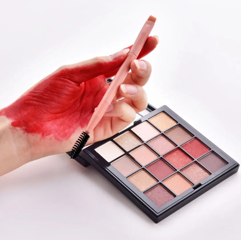 10-piece cosmetic brush set with pink wooden handles and nylon bristles arranged with makeup