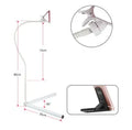 Black bedside mobile phone bracket with adjustable overhead shelf holding smartphone