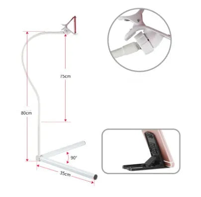 Black bedside mobile phone bracket with adjustable overhead shelf holding smartphone