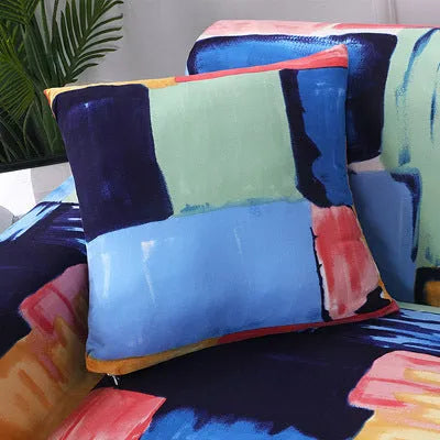 Geometric patterned stretch sofa slipcover on a double seat sofa with matching cushion