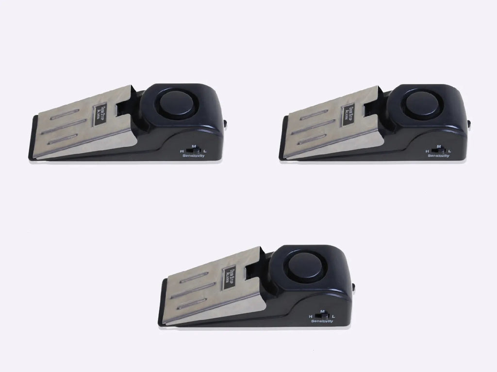 Black wedge door stop alarm with 120 dB siren, vibration sensor and stainless steel cover, for hinged doors