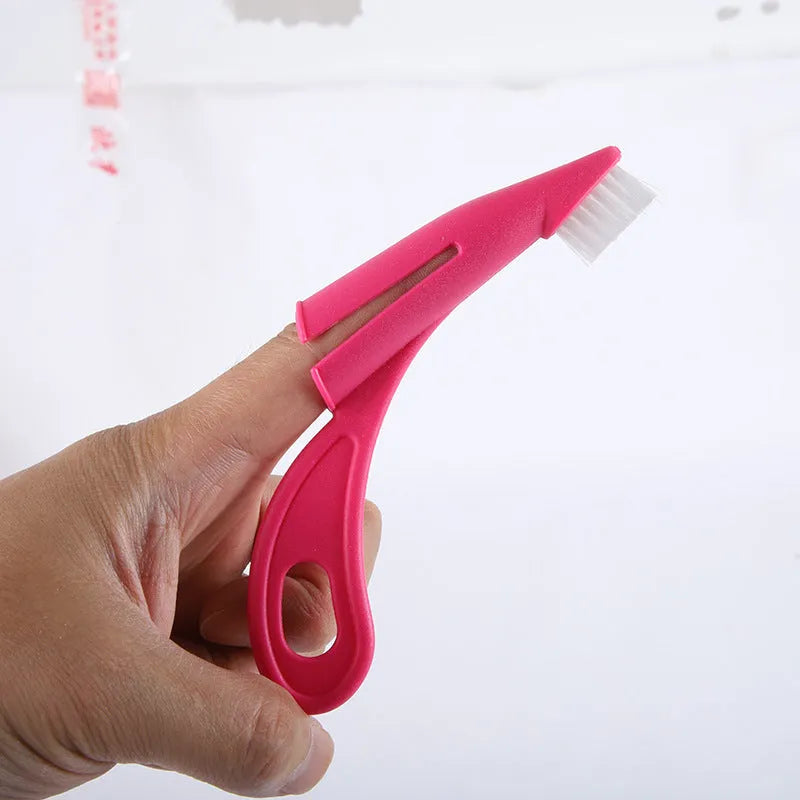 Red and white pet finger toothbrush with silicone bristles for cleaning dog and cat teeth