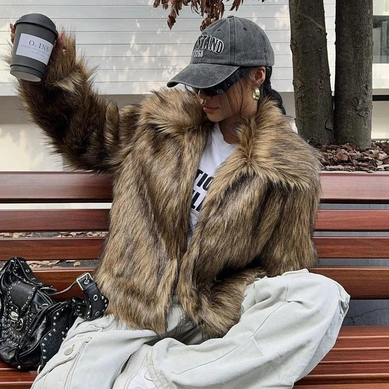Artificial fur coat with fur collar in short 40cm length showing thick fabric texture