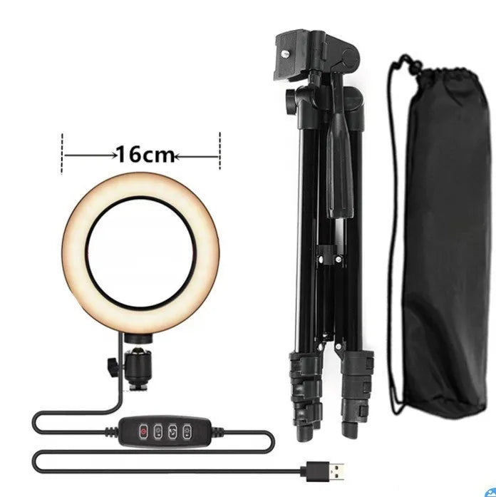 Adjustable silver live phone stand on a tripod base holding a mobile phone, extended to mid-height.