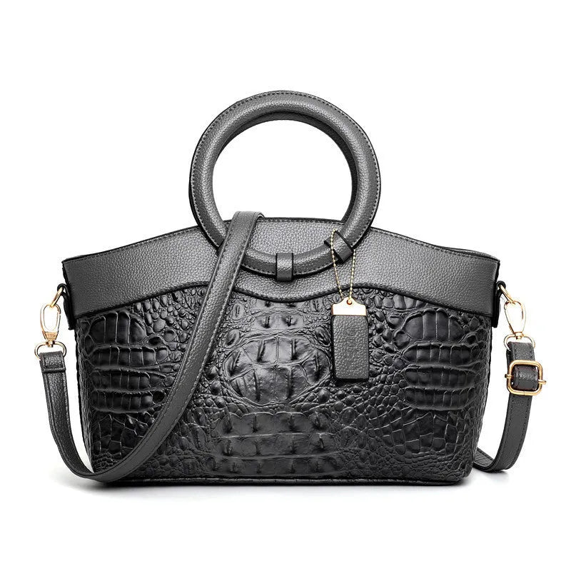 A casual fabric shoulder handbag for women in a chosen colour, showing zipper closure and internal pockets.