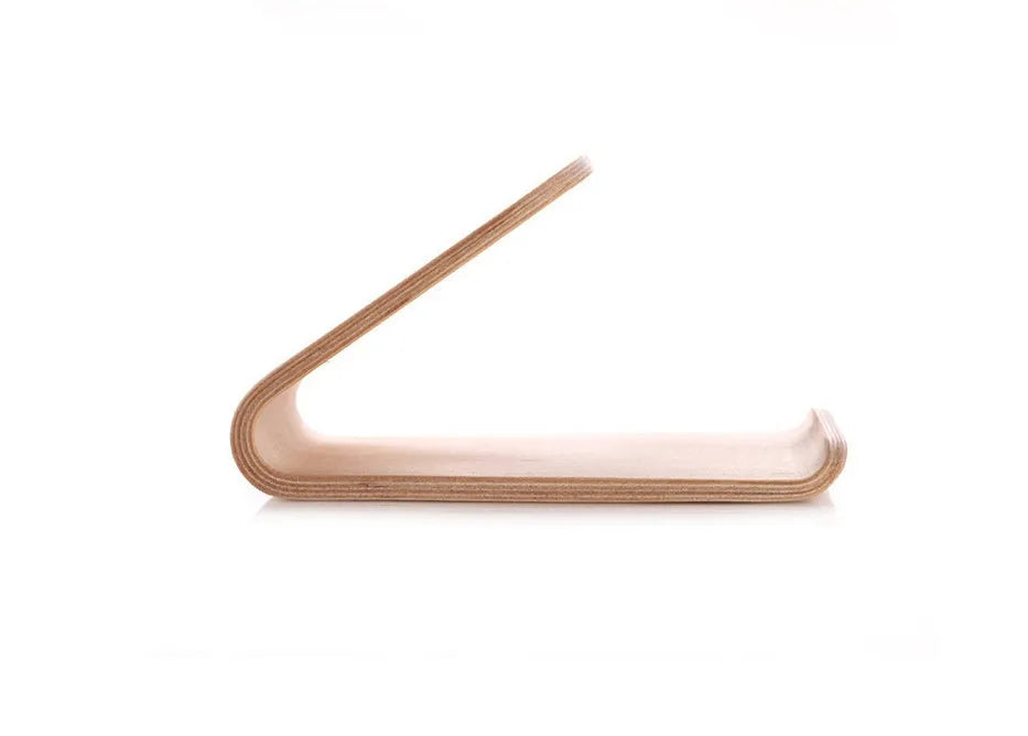 Minimalist wooden iPhone stand in walnut or white maple finish with a cable notch.