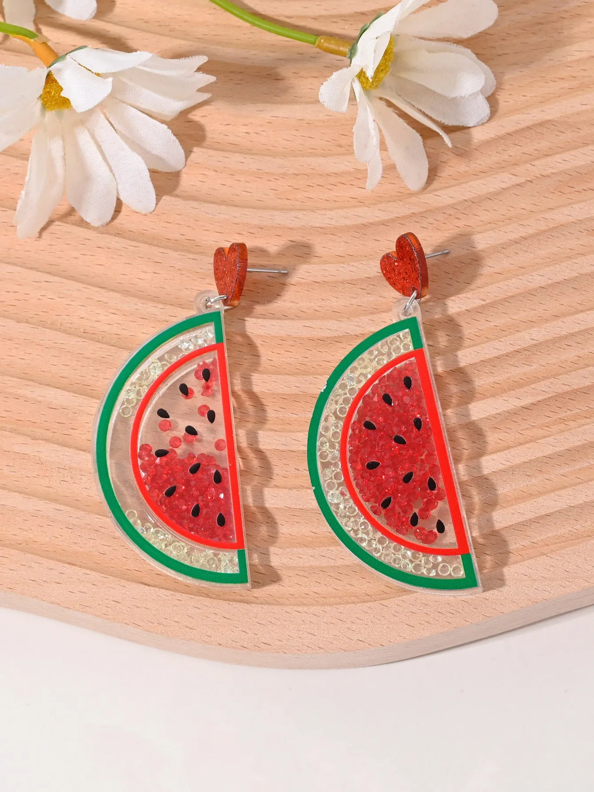 Colourful acrylic stud earrings with cherry, strawberry, watermelon, pineapple, coconut, cake, and ice cream designs.
