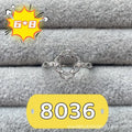 Oval open mouth copper ring with a 6*8 centre stone and five-pointed star ornament detail.