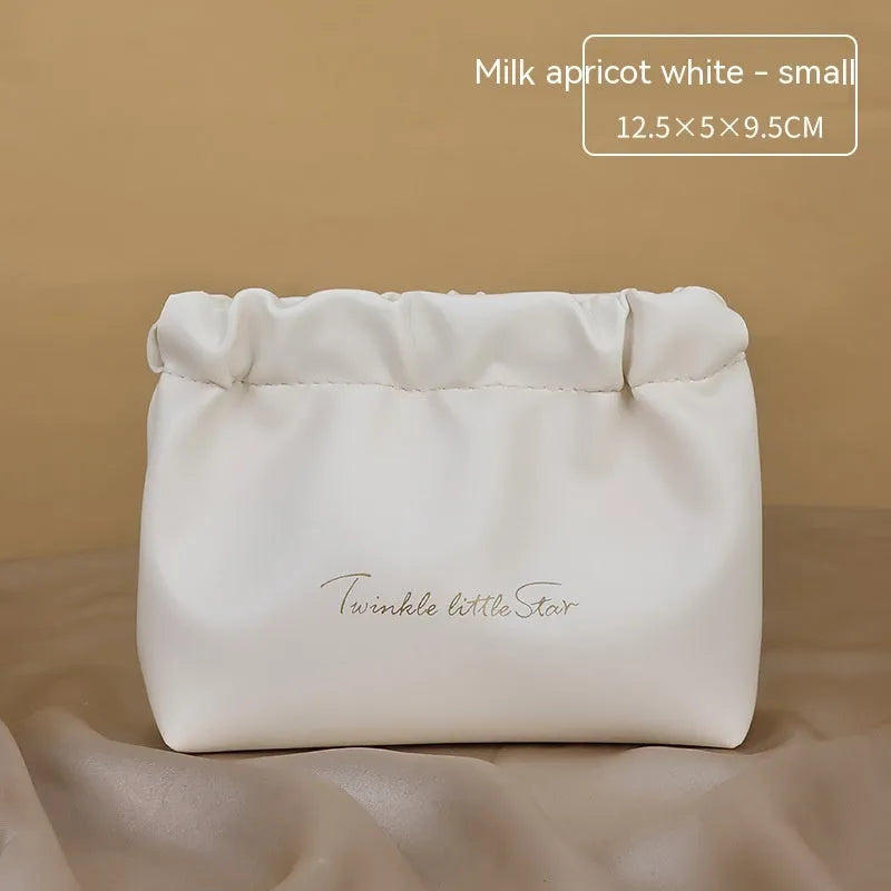 Leather travel toiletry bag in caramel mocha colour with dry wet separation compartments