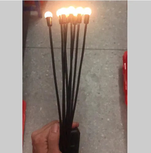 Solar-powered LED firefly ground lamp with multiple heads and ground spike for garden installation