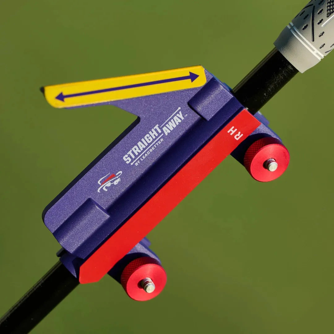 Plastic golf swing plane trainer simulator on a plain background.
