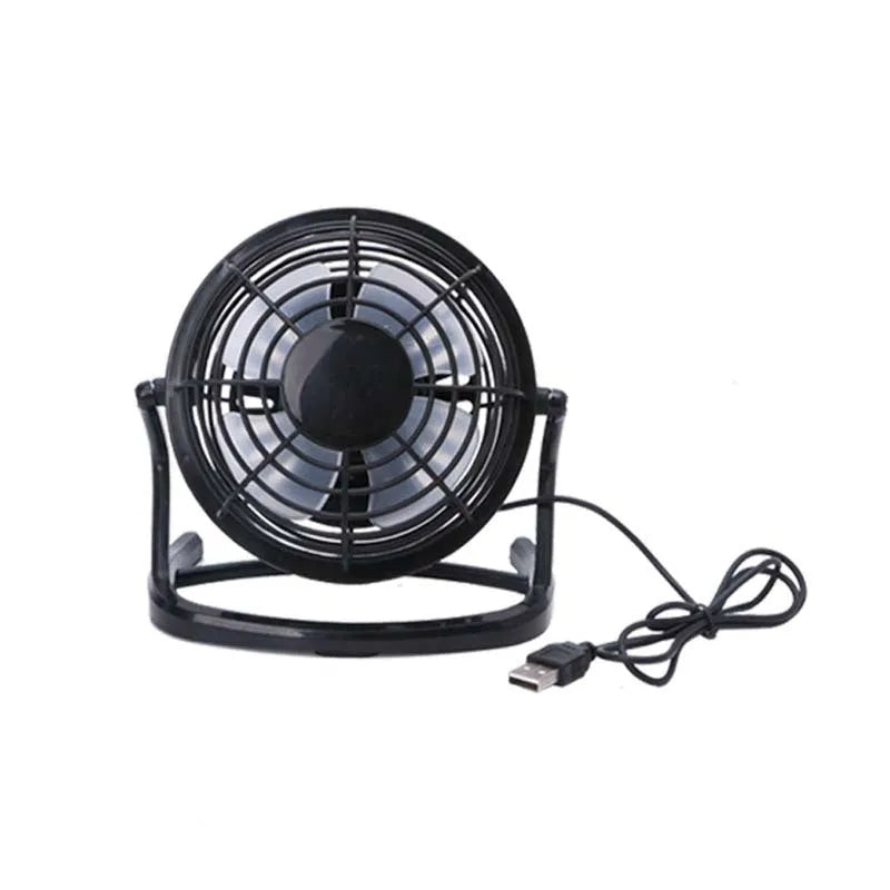 Mini adjustable USB desk fan in black, showing compact square design and angled breeze outlet