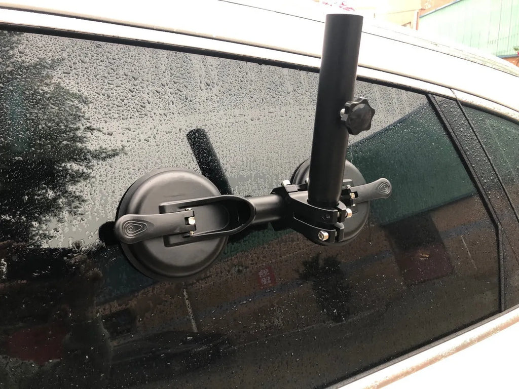 Black off-road car flagpole sucker base with round glass suction cup and rubber disc body.