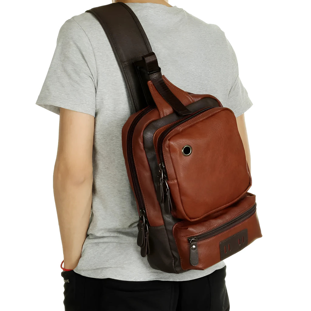 PU leather men's chest bag satchel in black, 21x13x34cm, with zip opening and ID pocket, fits 9.7 inch iPad