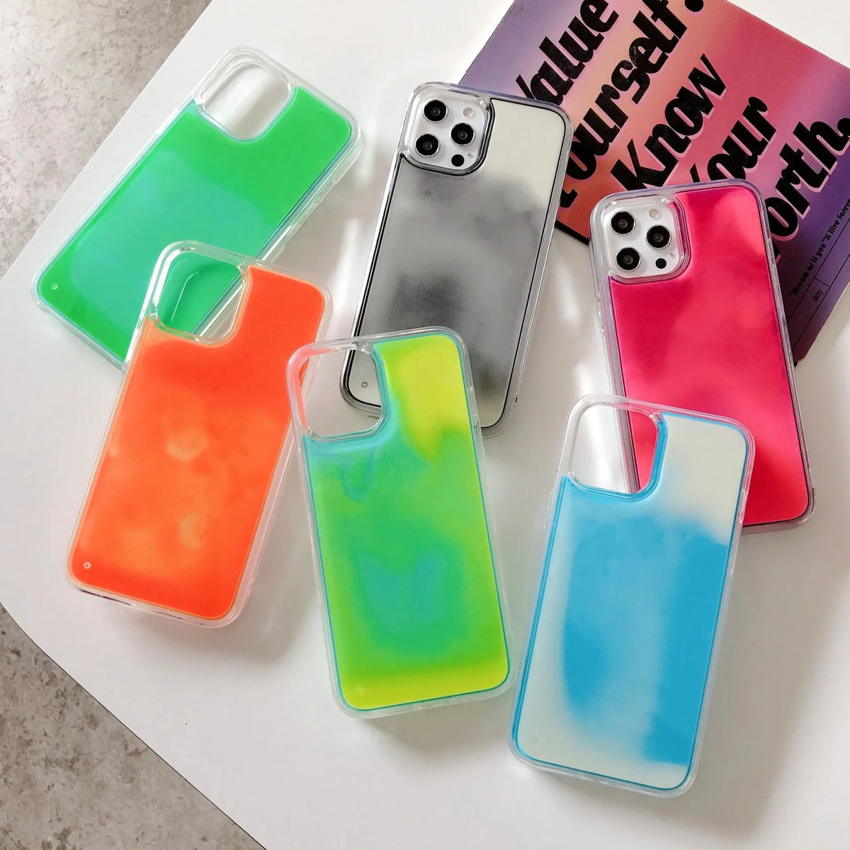 Luminous quicksand glitter phone case for iPhone, TPU rear cover, available in multiple colours.