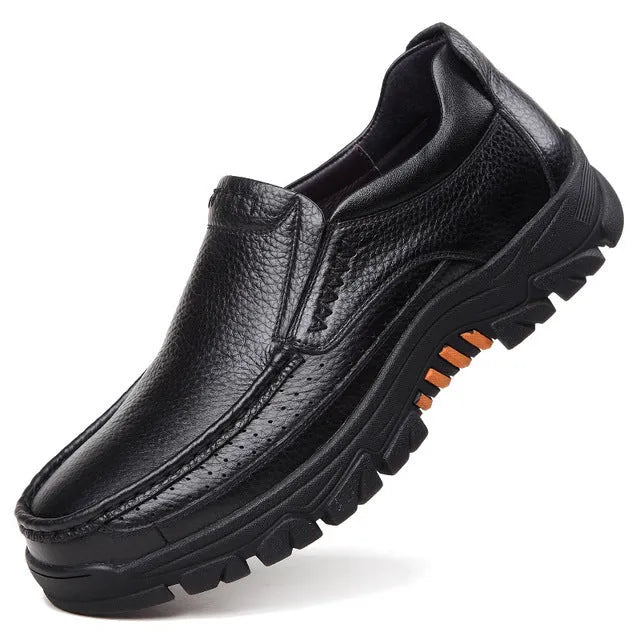 Men's black and brown cowhide leather slip-on business casual shoes with a rubber sole.