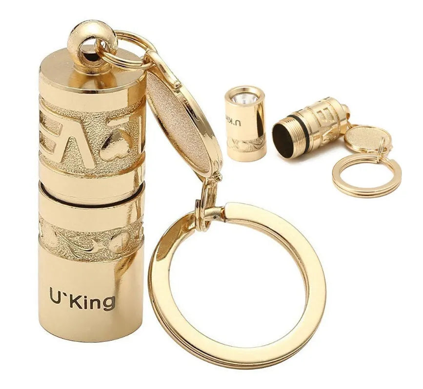 Gold zinc alloy waterproof mini LED flashlight on a keychain ring