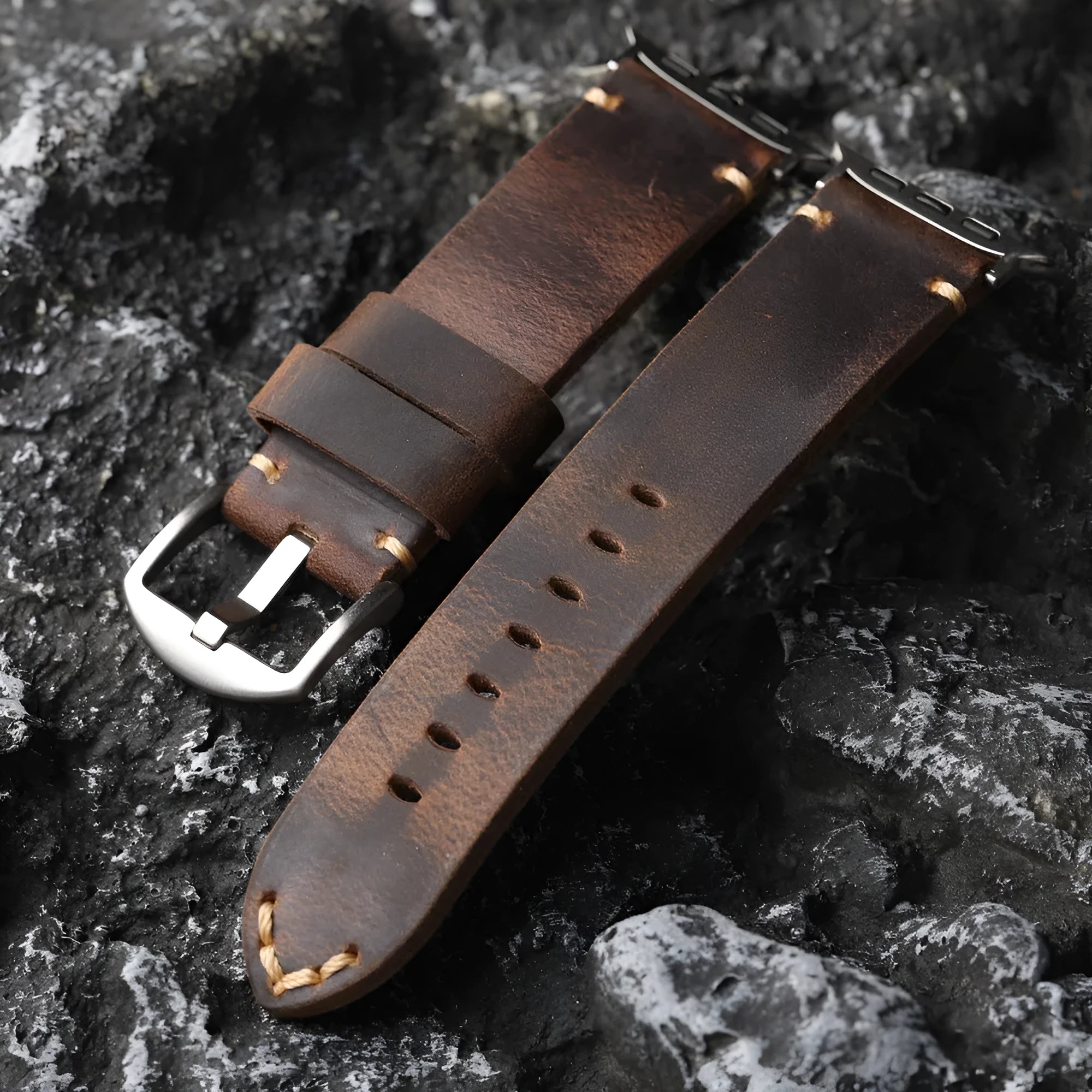 Brown handmade top layer cowhide watch strap with stainless steel buckle on a watch