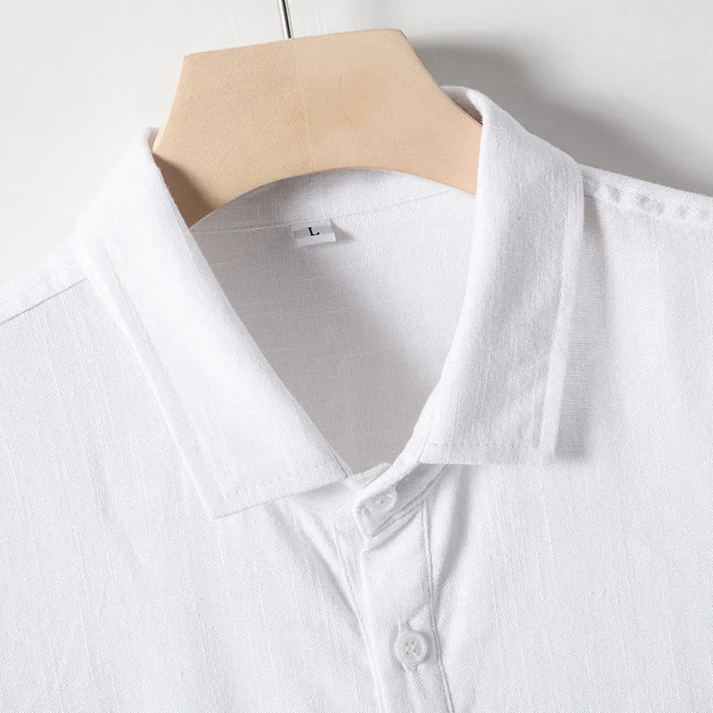 A man's loose lapel short sleeve T-shirt in a hemp blend fabric, shown in a solid colour.