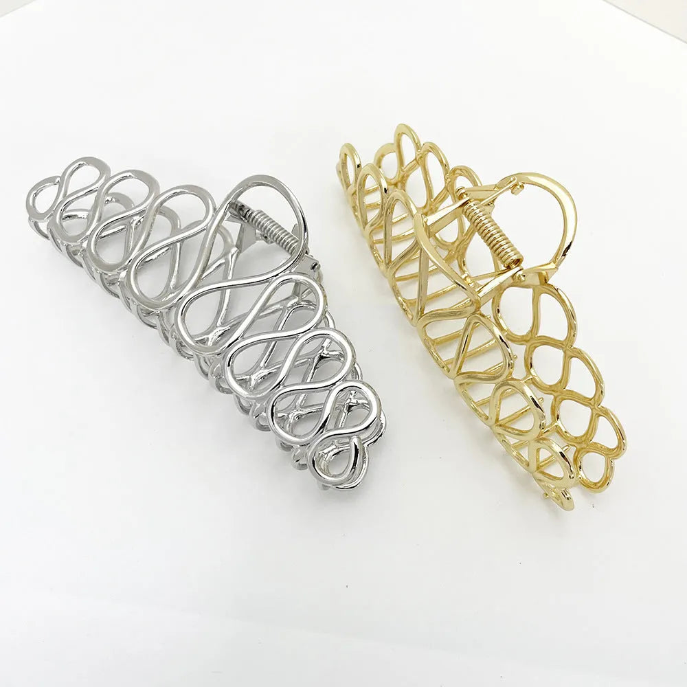 Gold or silver large alloy hair clip with tassel detail for women's updos