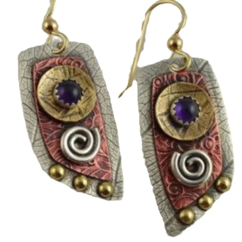 Gold geometric earrings with camouflage leopard print pattern and irregular shape