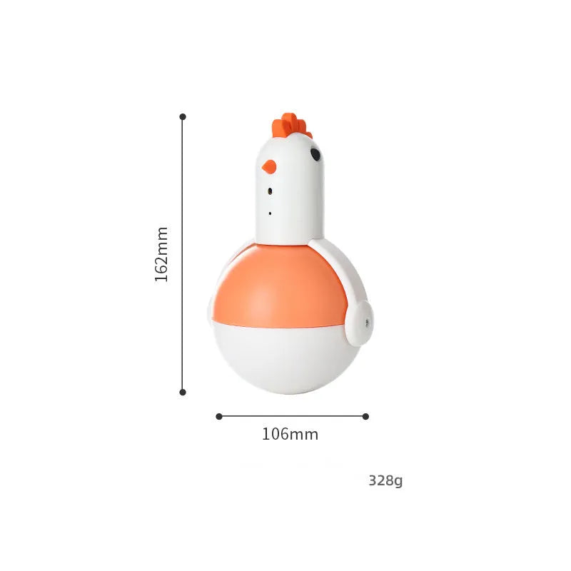 Green electric cat toy chicken with laser light feature on flat surface