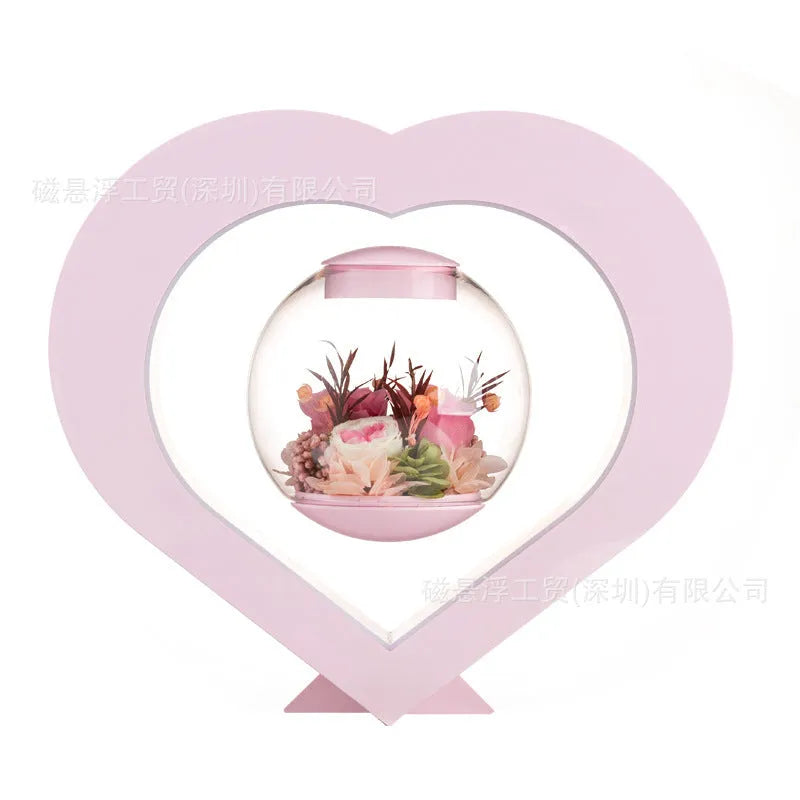 Pink preserved rose ornament with optional base and audio Bluetooth functionality for gift giving