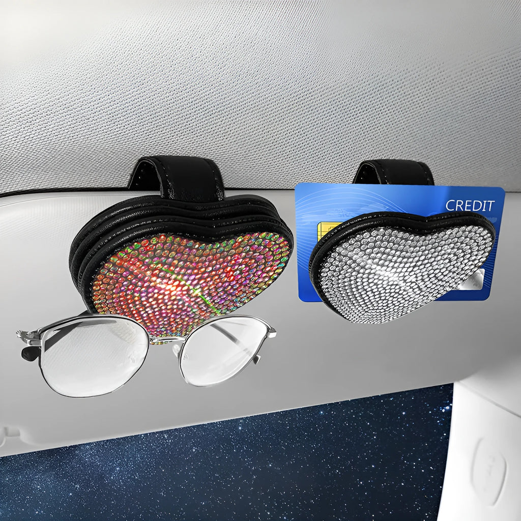 Black PU leather car sun visor clip with magnetic closure for holding sunglasses.