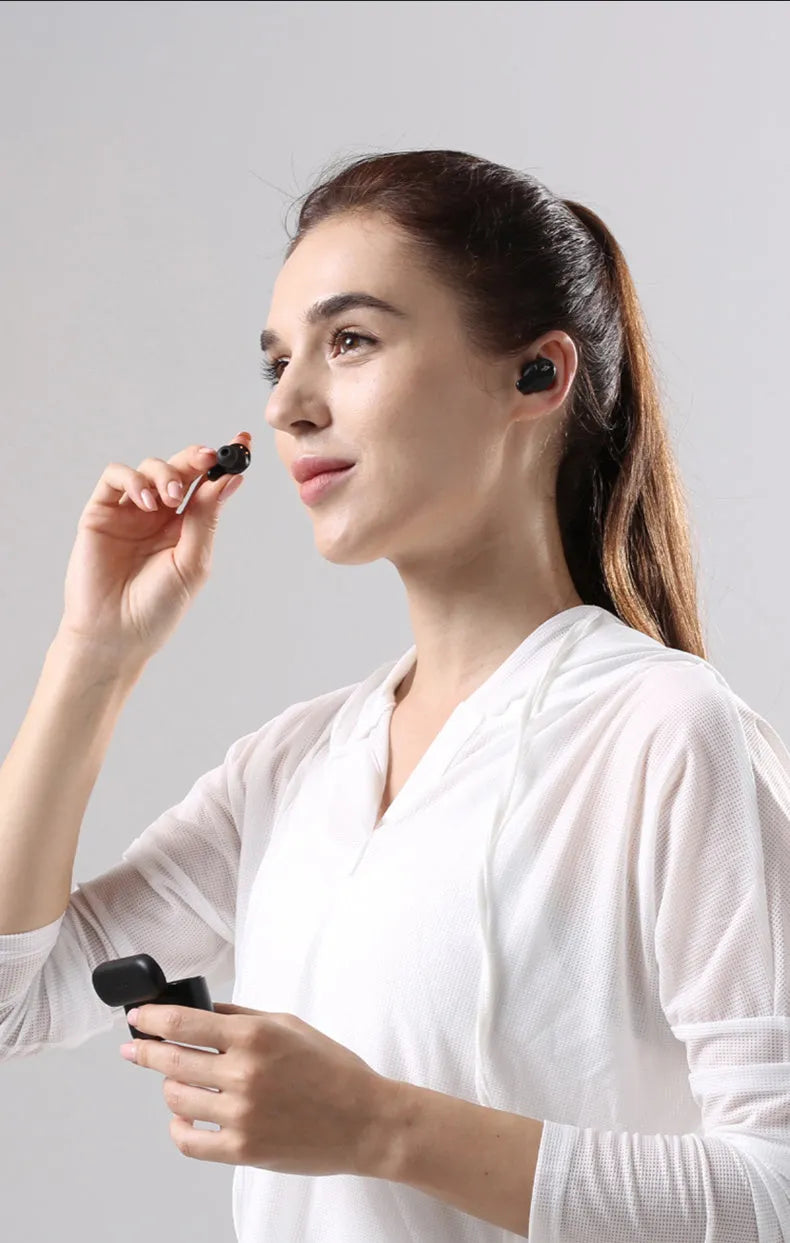 True wireless Bluetooth 5.0 in-ear earbuds in pearl white or black, sports waterproof, 10m transmission radius.