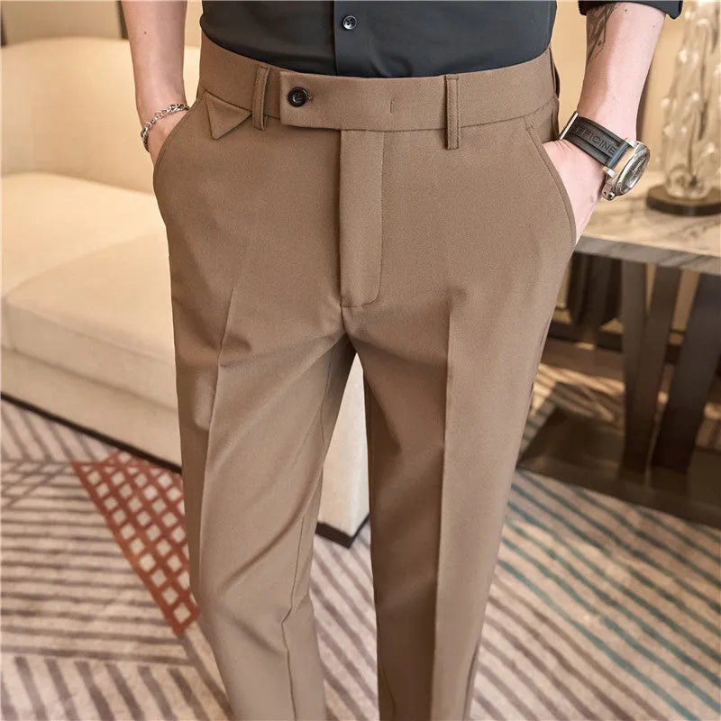 Men's brown suit trousers with waist stretch design, slim-fitting small straight cut, side view on hanger