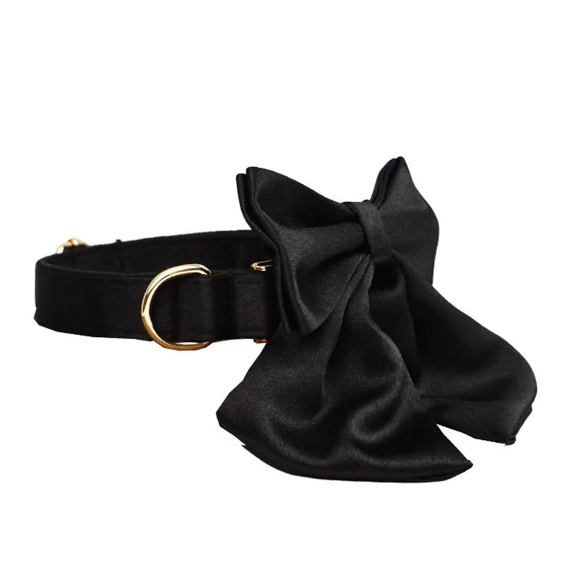 Dog harness and leash set with adjustable chest strap, matching bow, and vest accessories in fabric construction