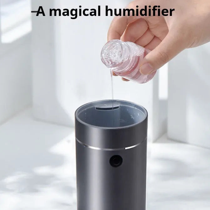 Dark gray column-shaped mini USB aromatherapy humidifier with 5W power and 0.5-1L reservoir for car and small room use