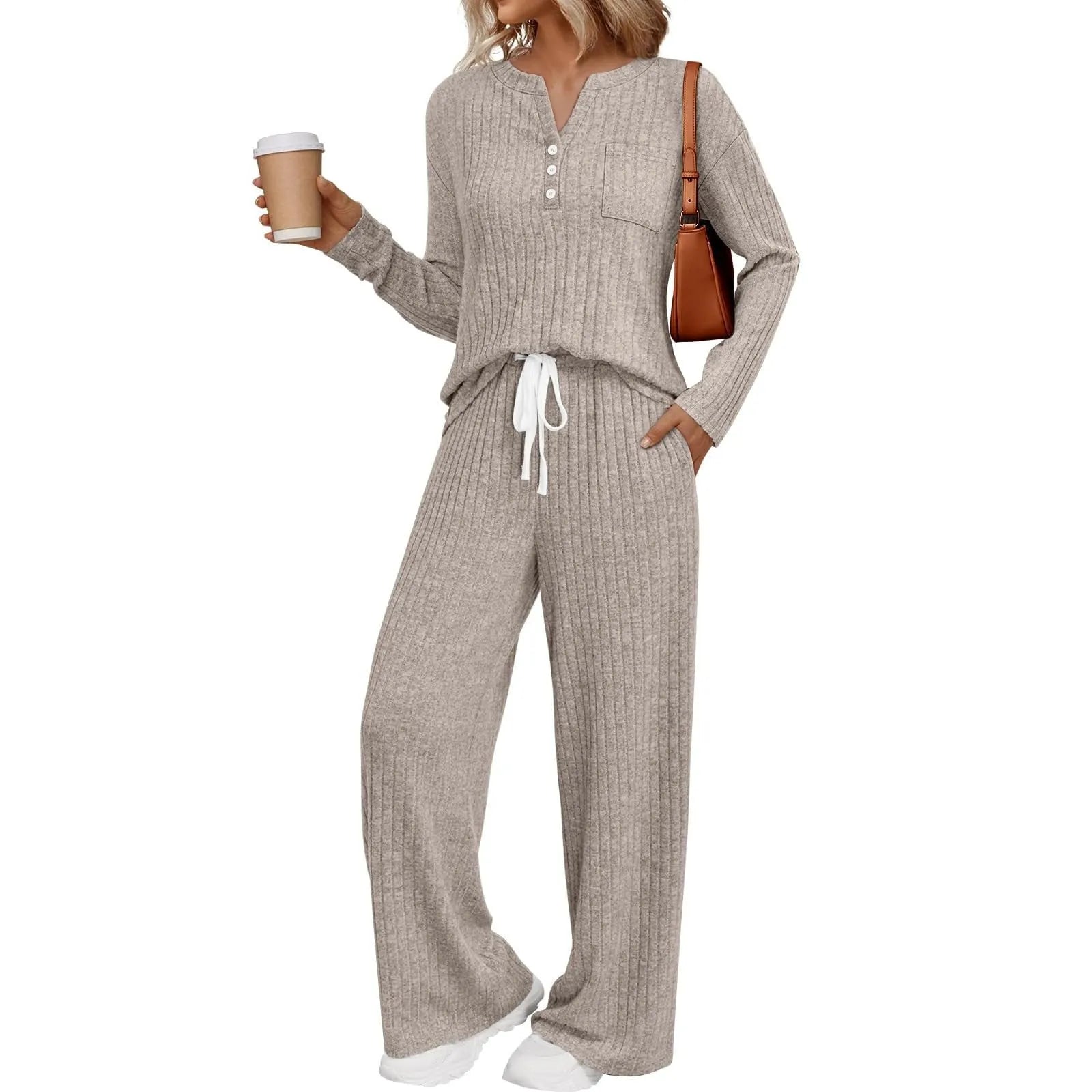 Knitted V-neck striped long coat with long sleeves, pockets, and a lace-up detail on a hanger.