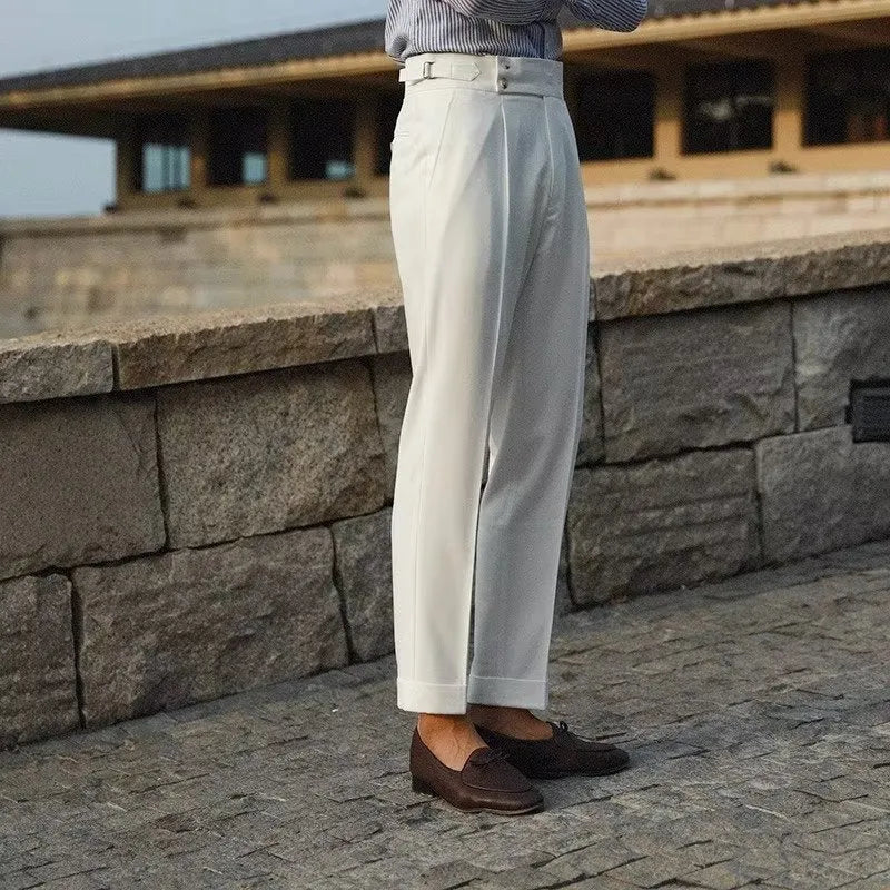 Slim fit straight leg suit trousers in a chemical fibre blend fabric for formal wear.