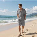 Linen hemp blend short sleeve shirt and matching shorts set in light blue, laid flat.