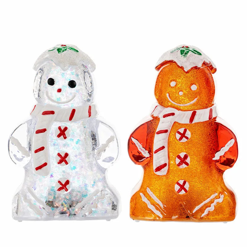 Glowing plastic gingerbread man Christmas ornament with red scarf, showing modern design and compact size.