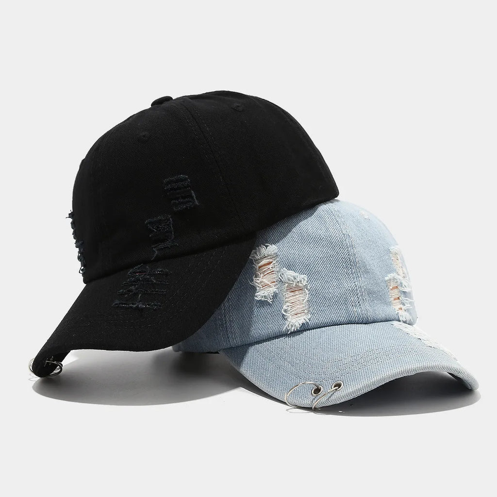 Men's adjustable denim peaked cap in black, shown from the side on a mannequin head