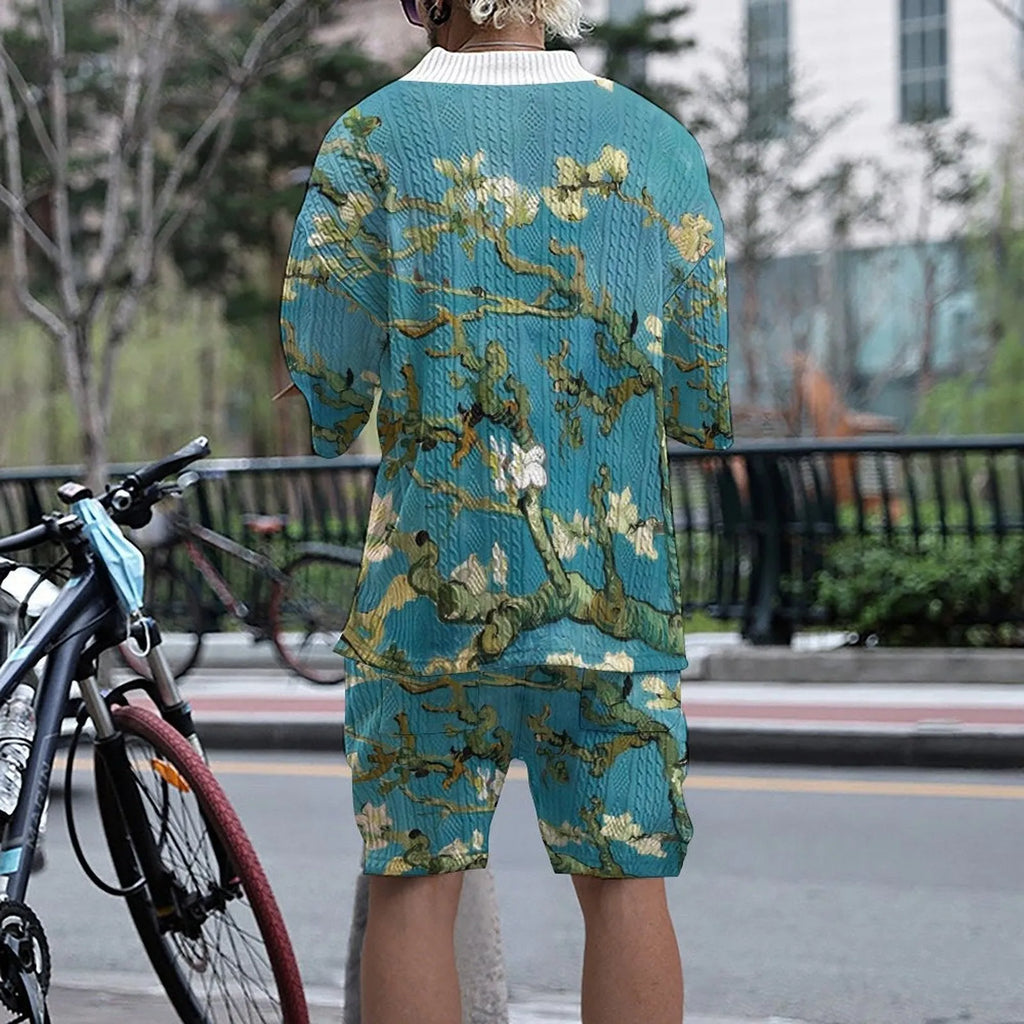 Peacock blue men's 3D printed knitted casual suit with T-shirt top and matching shorts.