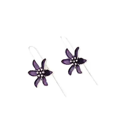 A pair of purple flower-shaped alloy drop earrings with a retro design on a white background.