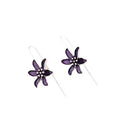 A pair of purple flower-shaped alloy drop earrings with a retro design on a white background.