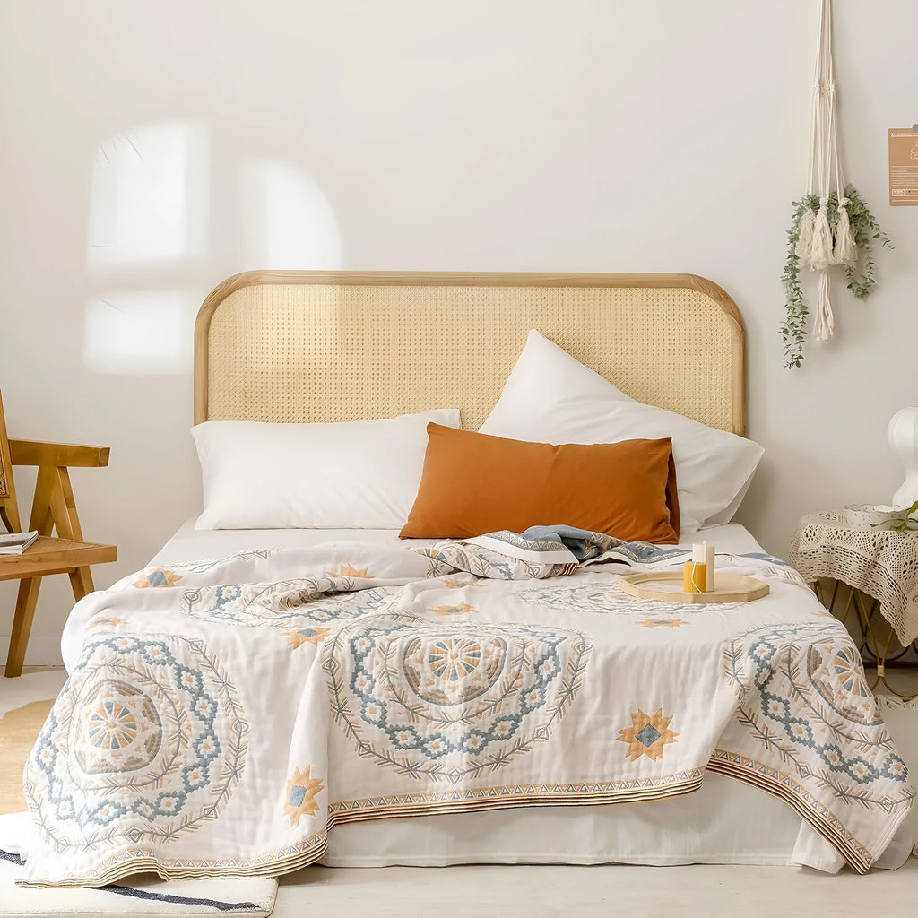 Cotton geometric pattern towel blanket laid flat, showing its modern design and size.